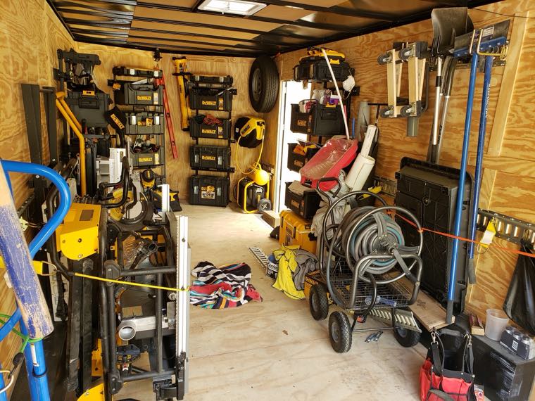 Interior of Jason's work trailer, stocked with professional tools